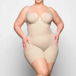 BUTT ENHANCING OPEN BUST BODYSUIT | SAND