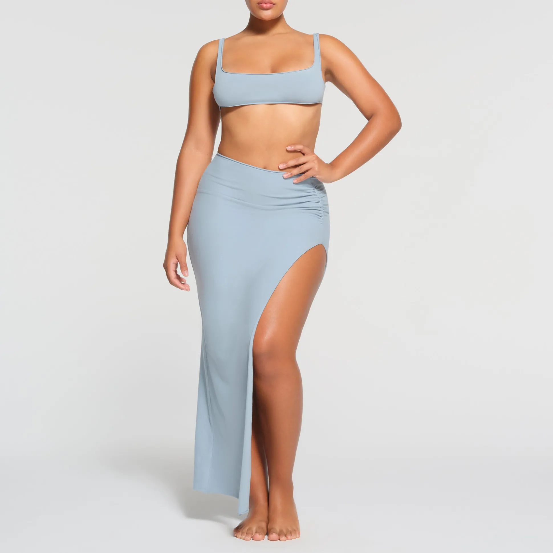 RAW EDGE SLIT LONG SKIRT | DENIM
