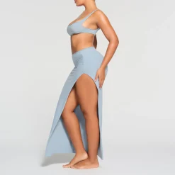RAW EDGE SLIT LONG SKIRT | DENIM