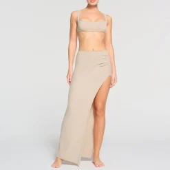 RAW EDGE SLIT LONG SKIRT | STONE