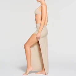 RAW EDGE SLIT LONG SKIRT | STONE