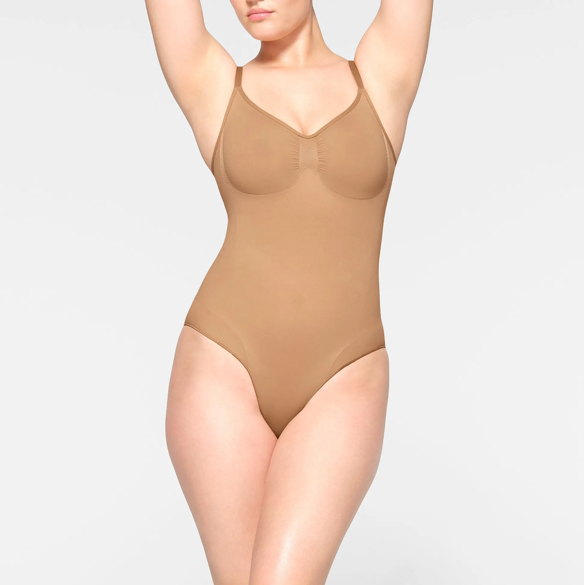 SEAMLESS SCULPT BRIEF BODYSUIT | OCHRE