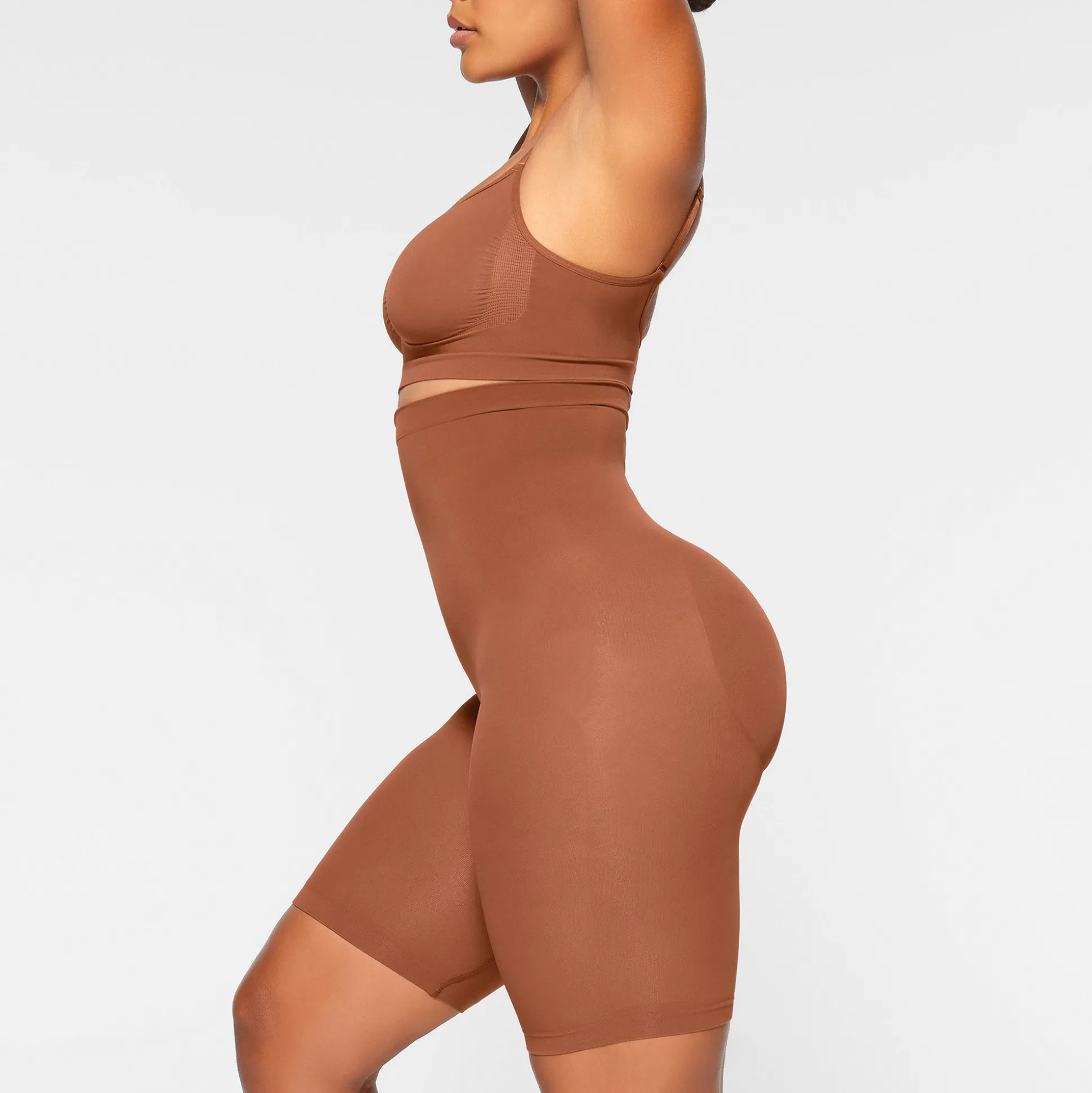 SEAMLESS SCULPT HIGH-WAISTED ABOVE THE KNEE SHORT | BRONZE