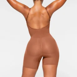 SEAMLESS SCULPT LOW BACK MID THIGH BODYSUIT | BRONZE
