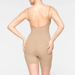 SEAMLESS SCULPT LOW BACK MID THIGH BODYSUIT | CLAY
