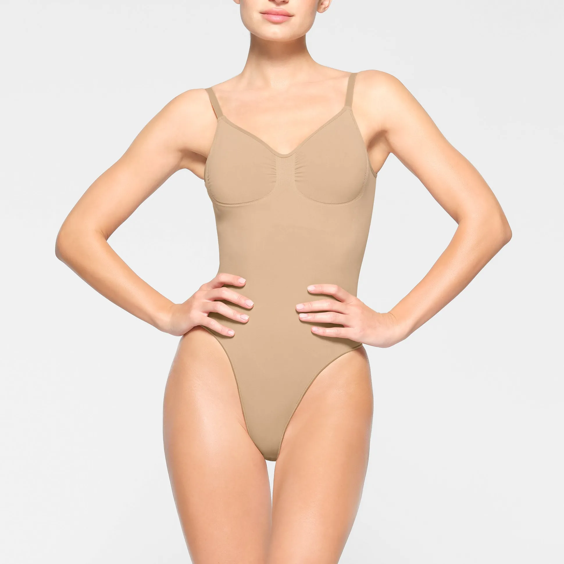 SEAMLESS SCULPT LOW BACK THONG BODYSUIT | CLAY