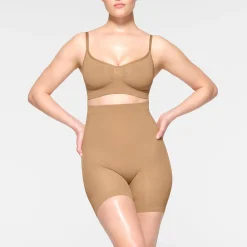 SEAMLESS SCULPT MID THIGH SHORT | OCHRE
