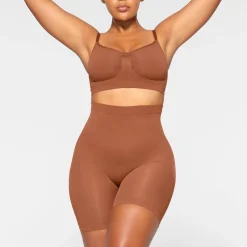 SEAMLESS SCULPT MID THIGH SHORT | BRONZE