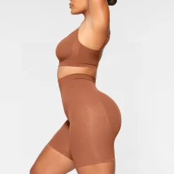SEAMLESS SCULPT MID THIGH SHORT | BRONZE
