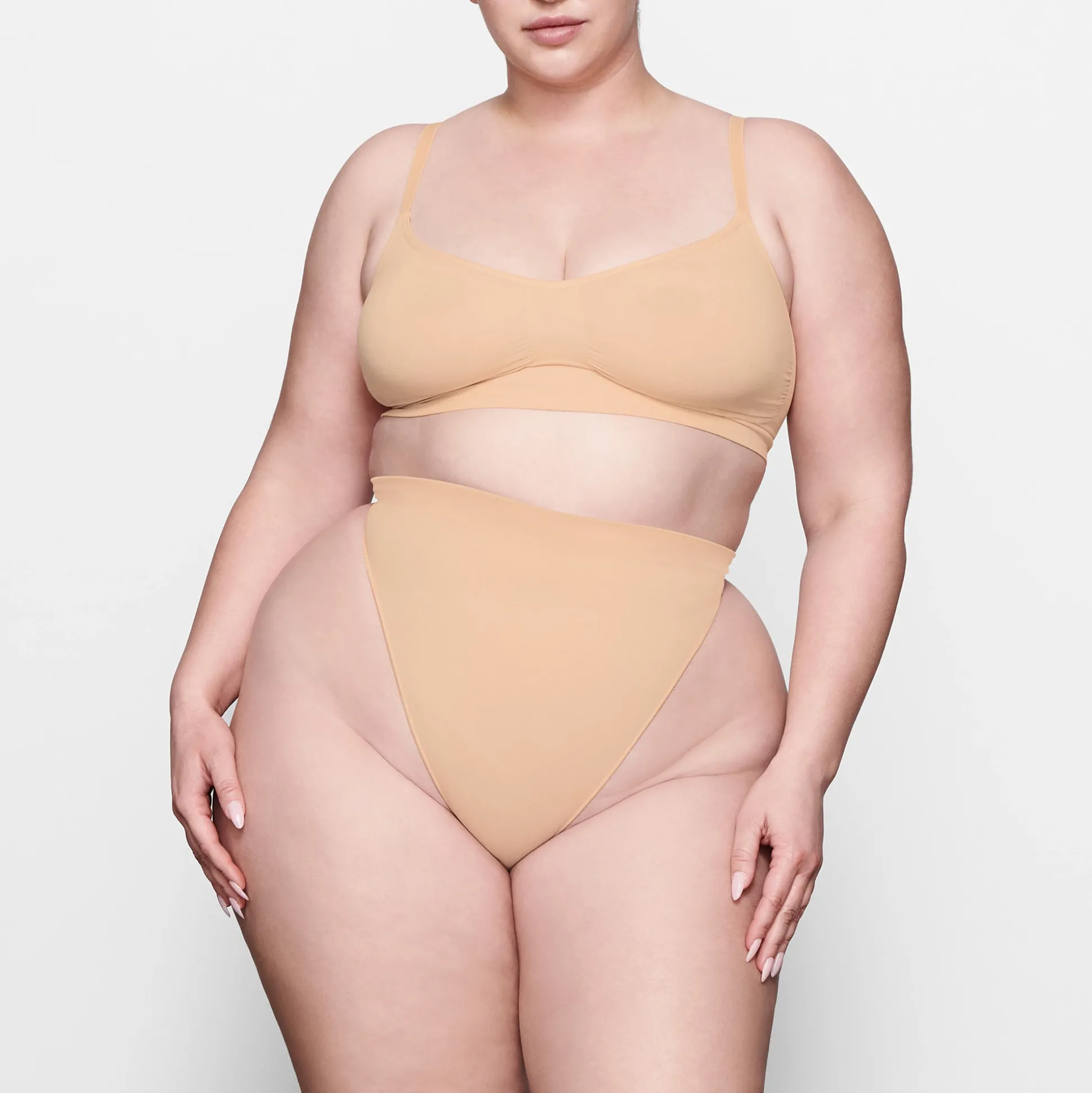 SEAMLESS SCULPT MID WAIST THONG | OCHRE