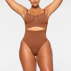 SEAMLESS SCULPT MID WAIST THONG | BRONZE