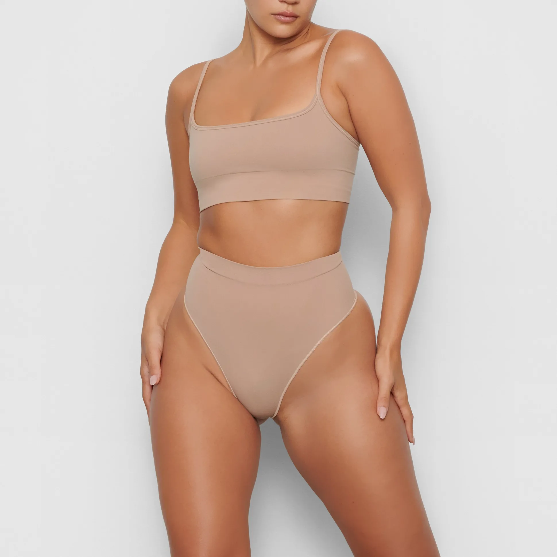 SEAMLESS SCULPT MID WAIST THONG | CLAY