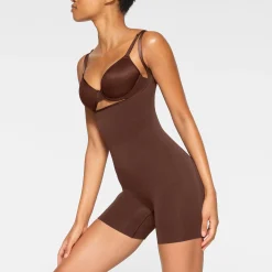 SEAMLESS SCULPT OPEN BUST SHORTIE BODYSUIT | COCOA