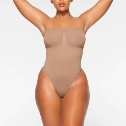 SEAMLESS SCULPT STRAPLESS THONG BODYSUIT | SIENNA