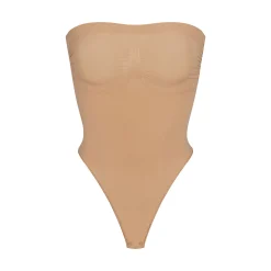 SEAMLESS SCULPT STRAPLESS THONG BODYSUIT | OCHRE