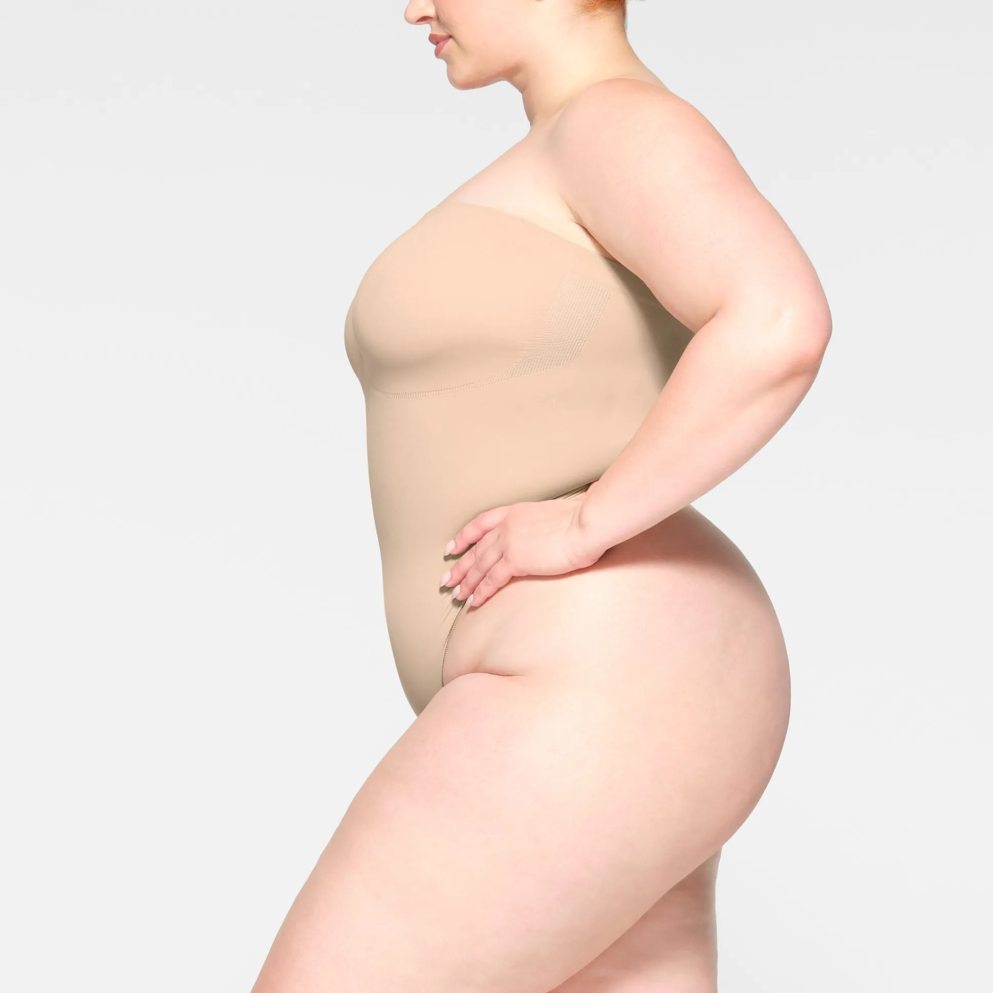 SEAMLESS SCULPT STRAPLESS THONG BODYSUIT | MICA