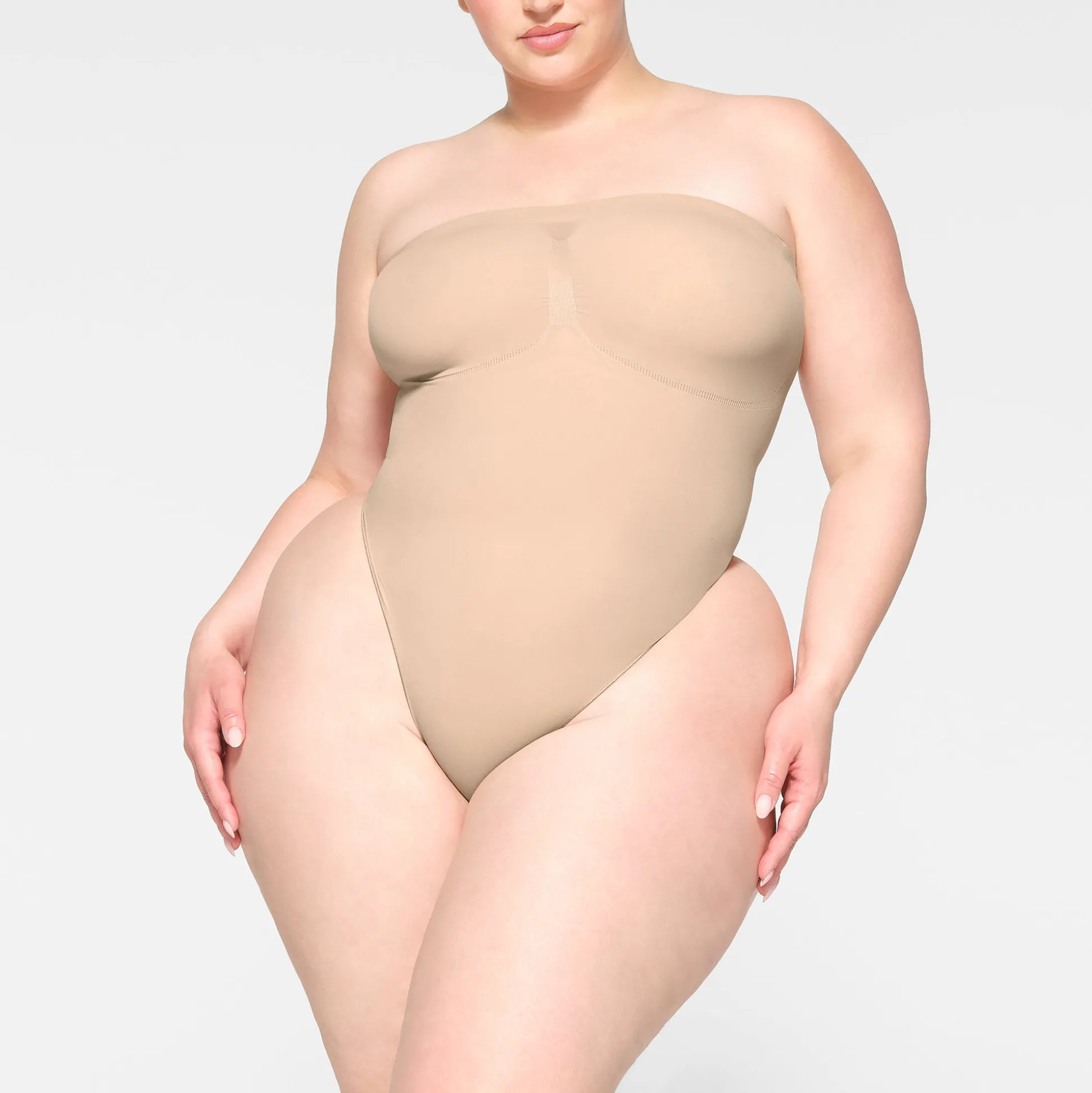 SEAMLESS SCULPT STRAPLESS THONG BODYSUIT | MICA