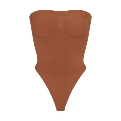 SEAMLESS SCULPT STRAPLESS THONG BODYSUIT | BRONZE