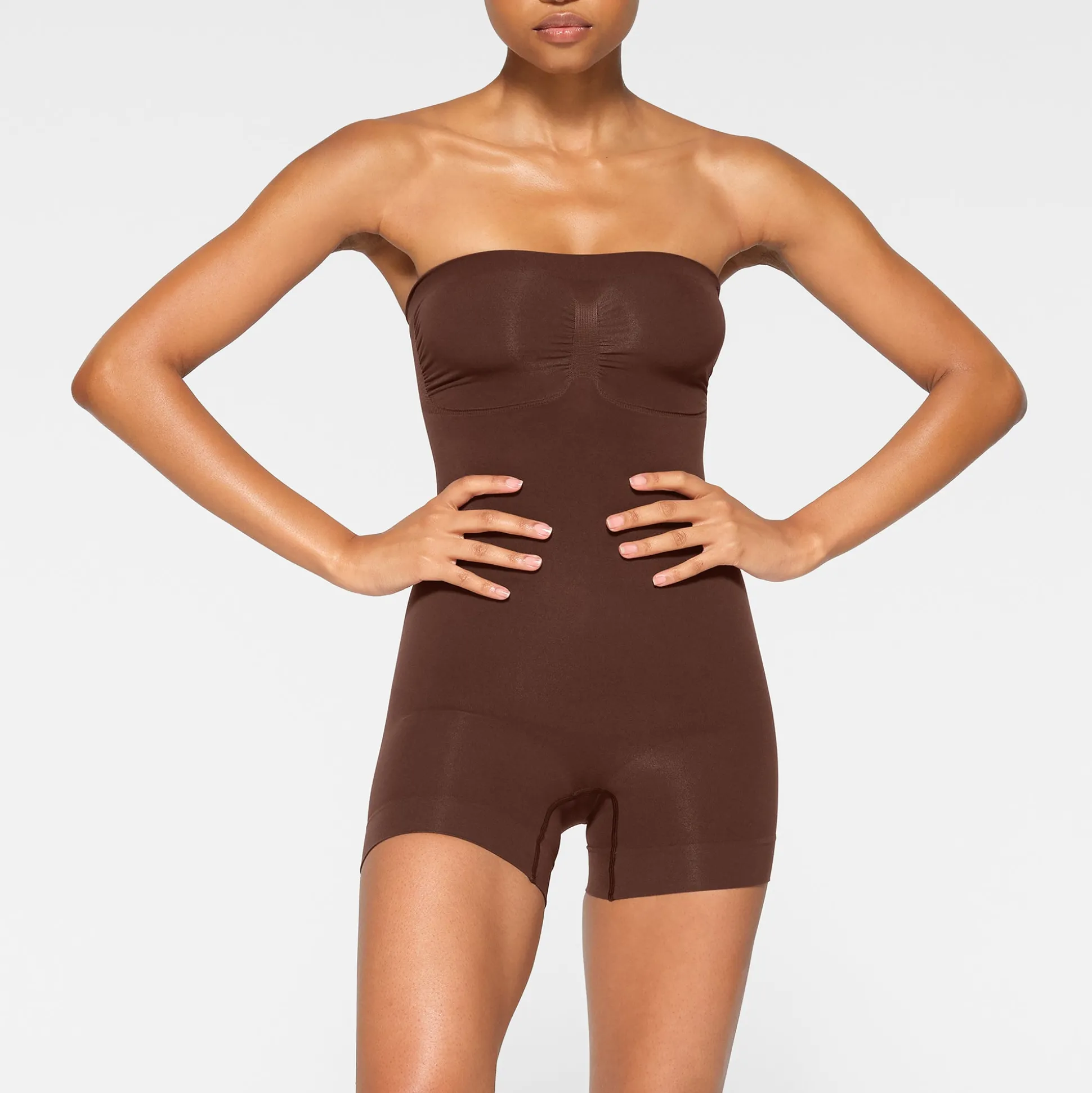 SEAMLESS SCULPT STRAPLESS SHORTIE BODYSUIT | COCOA