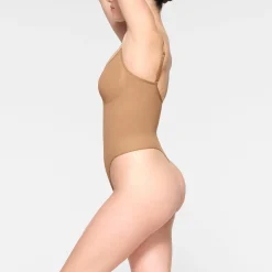 SEAMLESS SCULPT THONG BODYSUIT | OCHRE